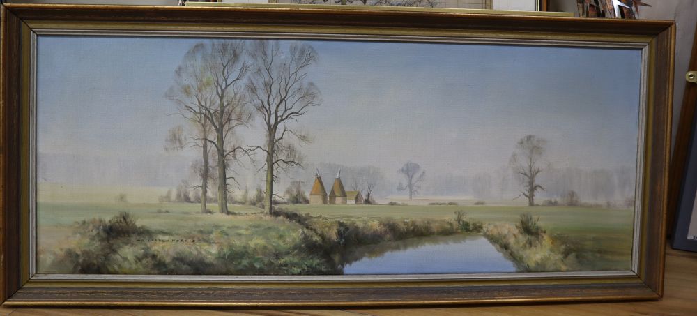 Michael Morris, oil on canvas, Landscape with oast houses, signed, 35 x 91cm